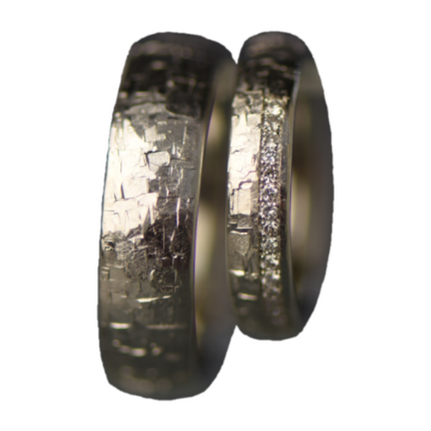 Schwungvoll. Ringe aus Platin mit Brillantphase.